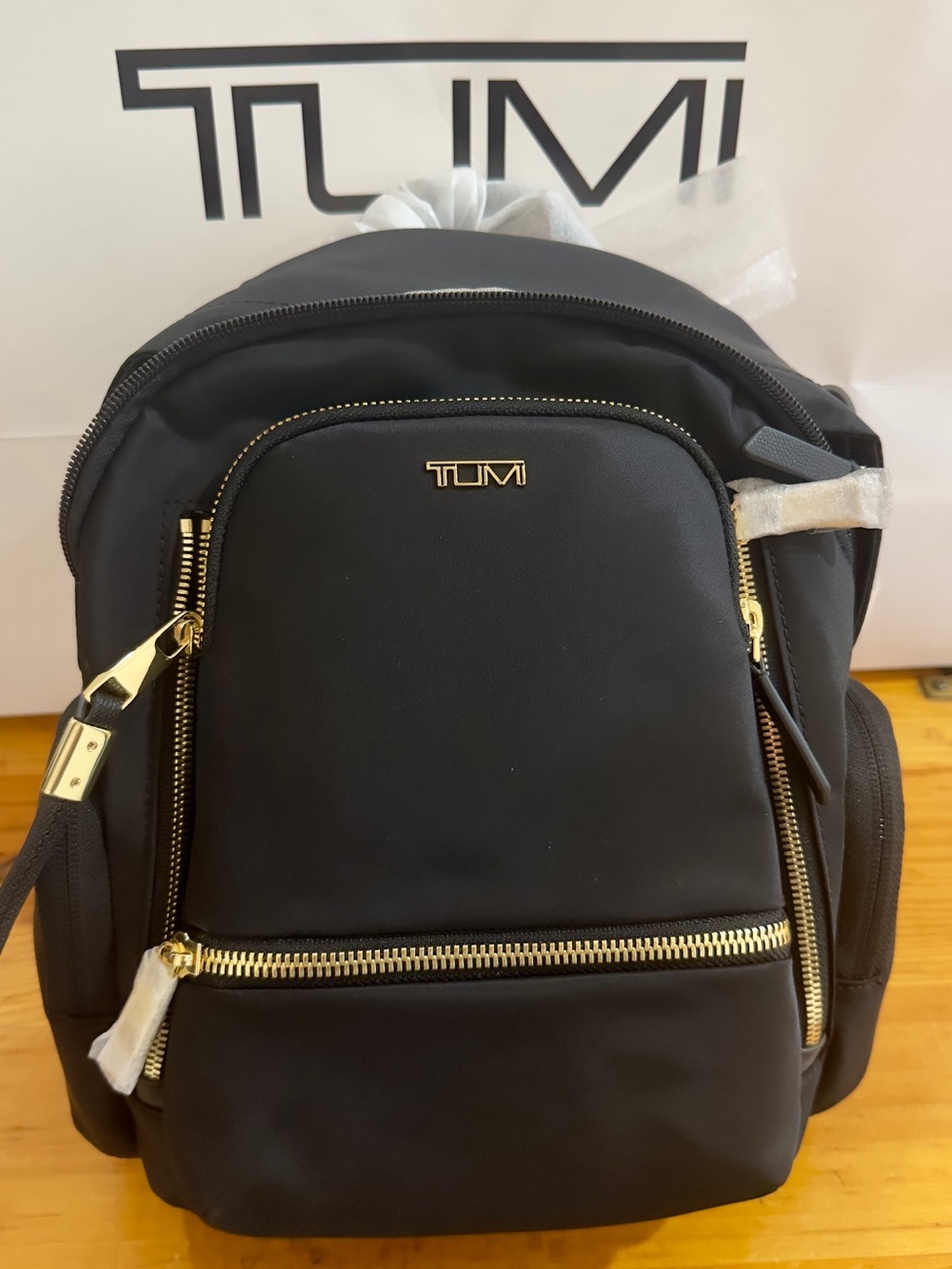 Brand New Celina Small Tumi Black Backpack with Gold Accents